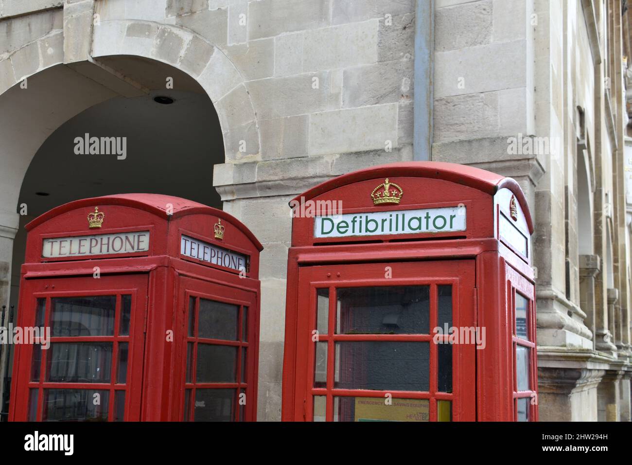 close up of bright red old telephone boxes outside. Vintage, Britiish