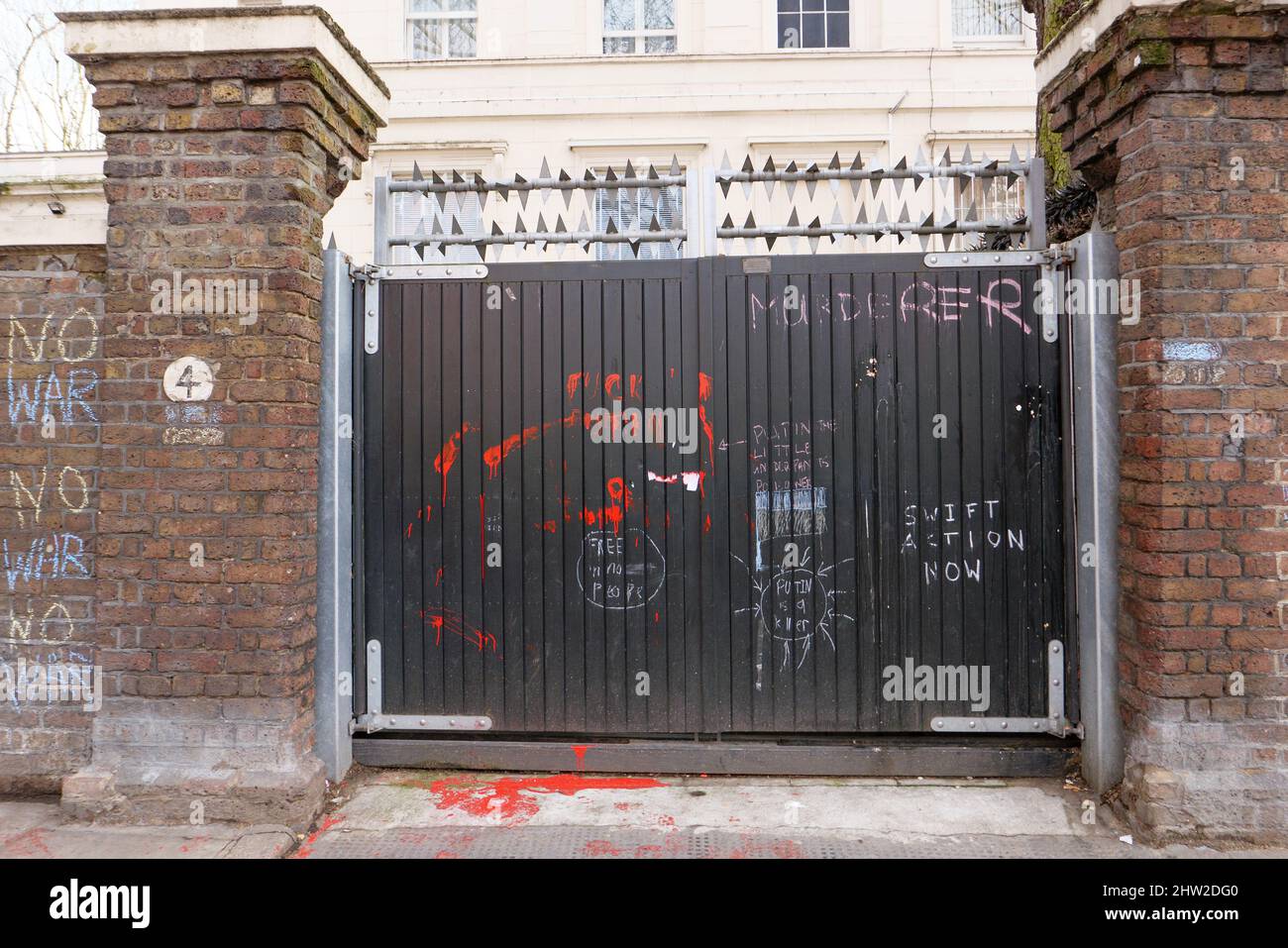 London, England. 3rd March 2022. Anti Russian War messages on the walls and a gate of the Russian Embassy to protest over the Russian war in Ukraine. Russia invaded neighbour Ukraine on the 24th February 2022, since the invasion, there has been a global condemnation of the war. Credit: SMP News / Alamy Live News Stock Photo