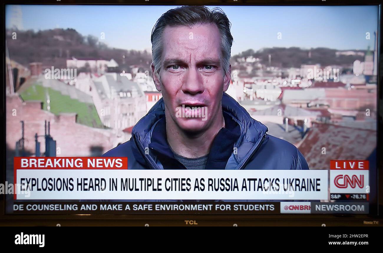 A TV screenshot of CNN news reporter Jim Sciutto reporting live from