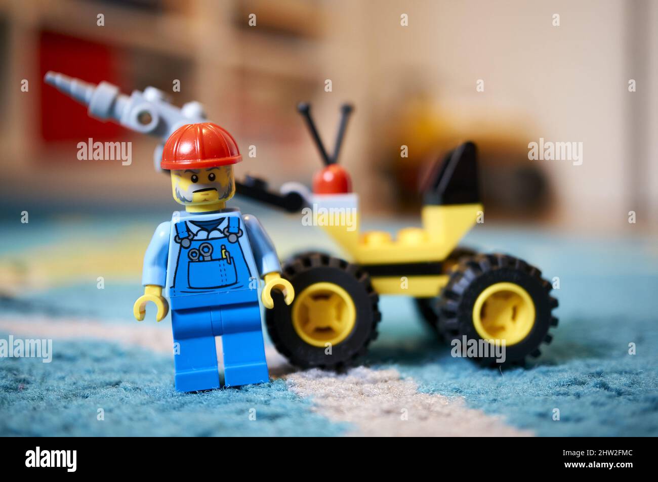 Closeup shot of a construction worker toy figure team with red helmets  Stock Photo - Alamy