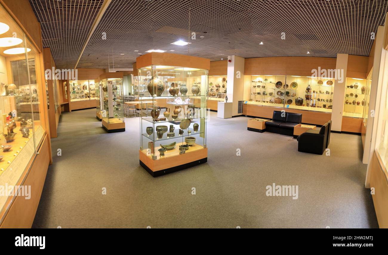Pottery in display cases on show at the Potteries Museum and Art