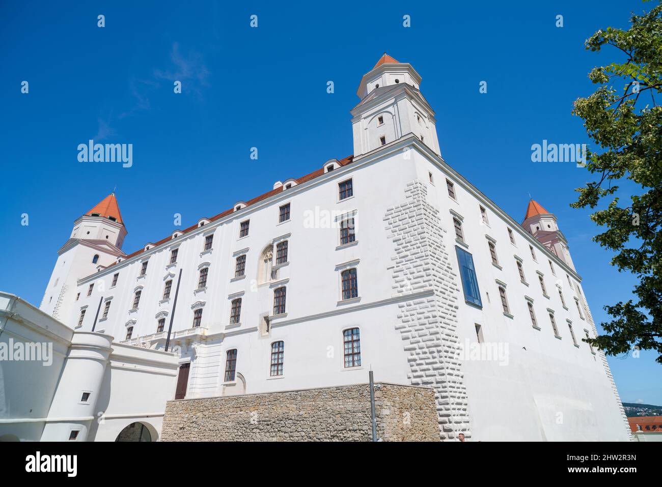 Bratislava Castle is the main castle of Bratislava, the capital of Slovakia. The massive rectangular building with four corner towers stands on an iso Stock Photo