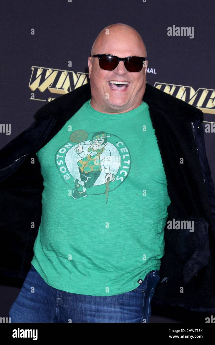 March 2, 2022, Los Angeles, California, USA: Michael Chiklis wavering a Celtics shirt at the Winning Time - The Rise of The Lakers Dynasty LA Premiere at Ace Hotel. (Credit Image: © Kay Blake/ZUMA Press Wire) Stock Photo