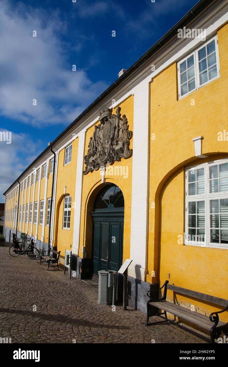 Kaalund Monastery (Kaalund Kloster or Kalundborg Slots Ladegård) is located in Kalundborg Municipality, Denmark. Historic yellow and white building wi Stock Photo