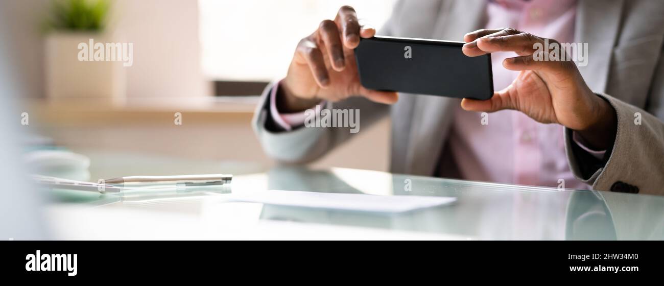 Remote Check Deposit Using Mobile Remote. Online Capture Stock Photo