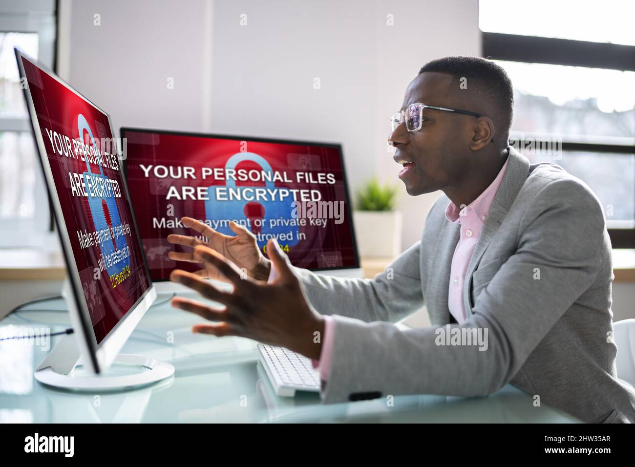 Ransomware Malware Attack. Hacked Business Computer. Cyber Security Breach Stock Photo