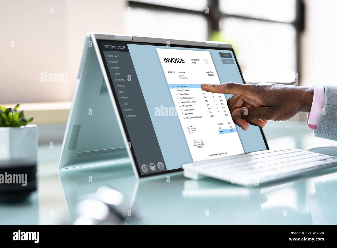E Invoice Business Management. Accountant Using Electronic Invoice Stock Photo