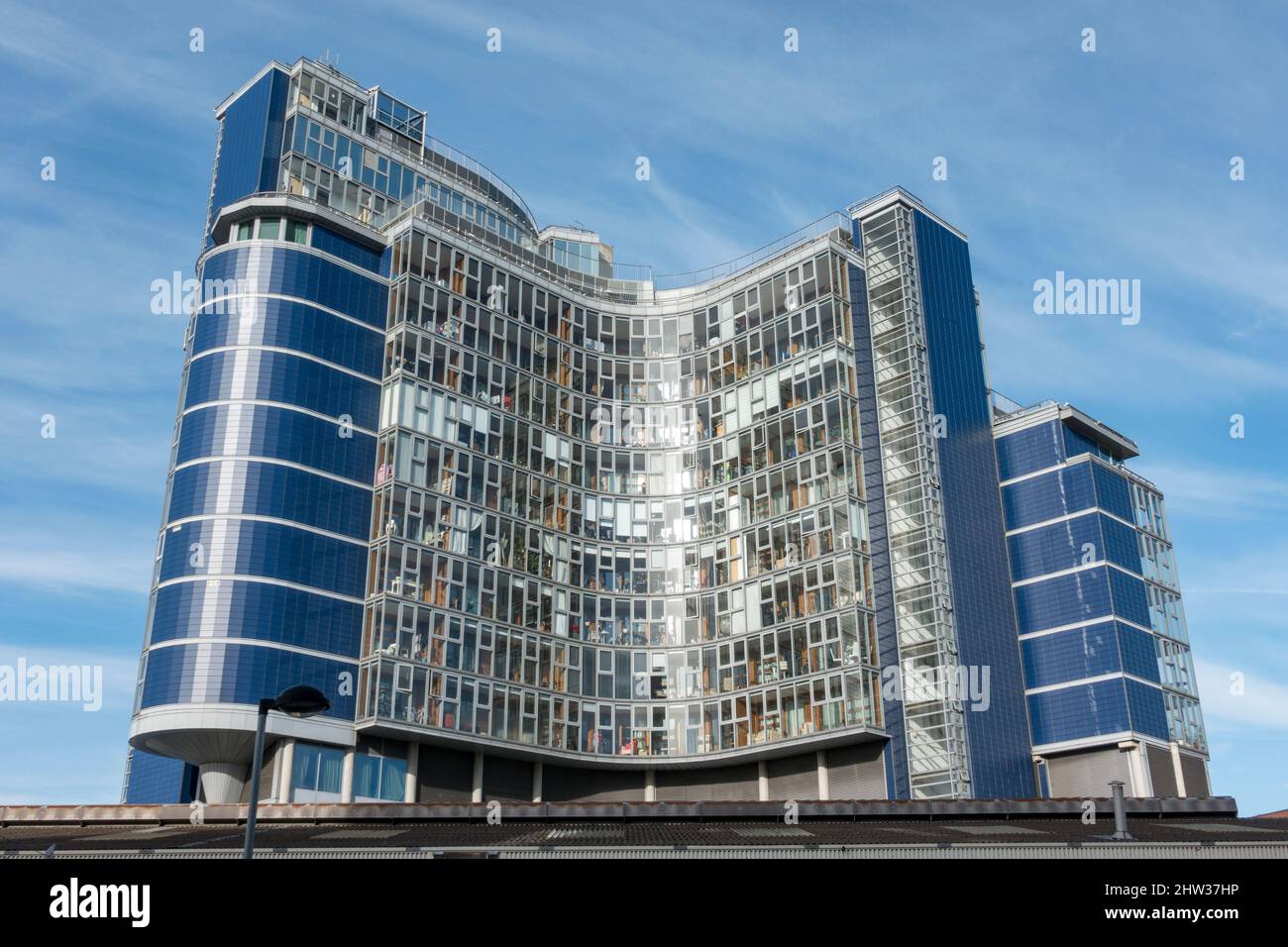 South facing facade of Falcon Wharf (34 Lombard Road), an impressive development on the side of the River Thames in London, UK. Stock Photo