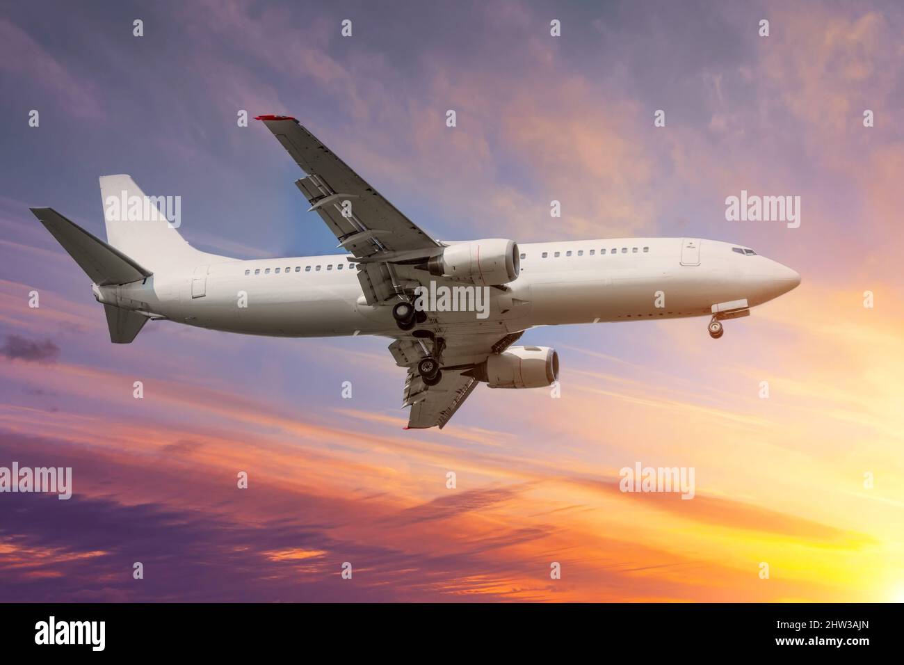 Beautiful sunset sky above clouds with dramatic light Stock Photo