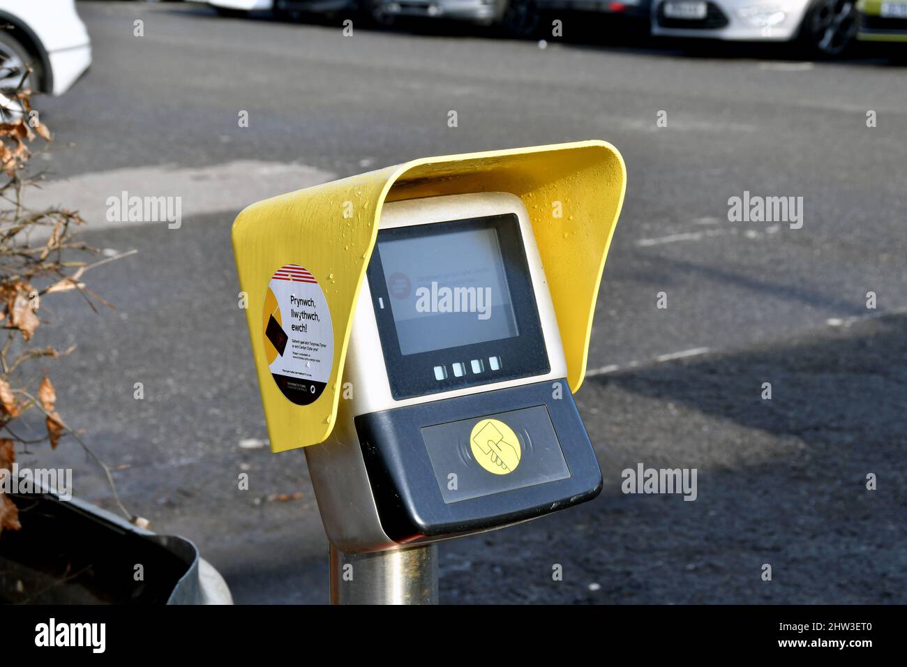 Taffs Well, near Cardiff, Wales - February 2022: Contactless terminal at the entrance to railway station for rail passengers to activate their ticket Stock Photo