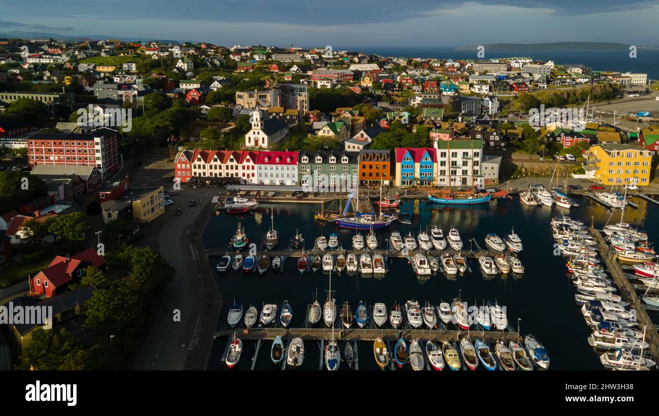 Beautiful aerial view of the city of Torshavn in the Faroe Islands and its classic colorful houses, red building with grass Stock Photo