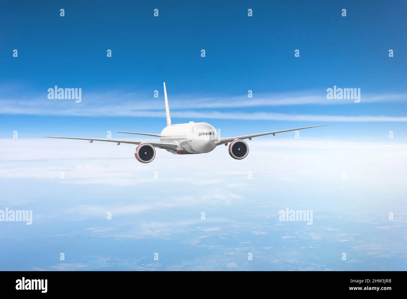 Passenger plane flies in the sky, performing flight Stock Photo - Alamy