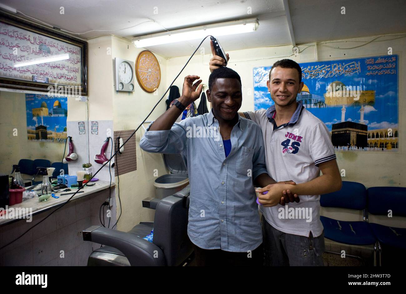 Naples, Italy 16/09/2010: The barber, Market Square Mosque ©Andrea Sabbadini Stock Photo