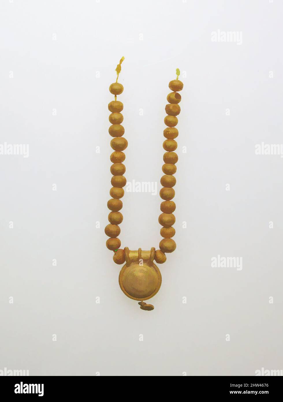 Art inspired by Necklace with bulla and gold beads, 7th–5th Century B.C., Etruscan, Gold, Other: 18 1/2 in. (47 cm), Gold and Silver, Classic works modernized by Artotop with a splash of modernity. Shapes, color and value, eye-catching visual impact on art. Emotions through freedom of artworks in a contemporary way. A timeless message pursuing a wildly creative new direction. Artists turning to the digital medium and creating the Artotop NFT Stock Photo