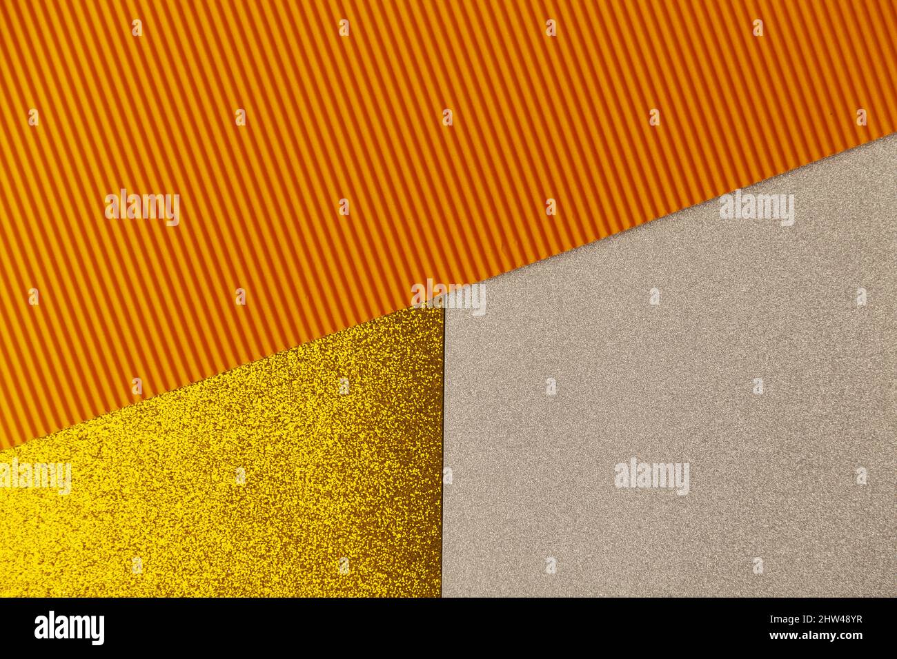 abstract background, mixed colors, orange, brown, gold, black, silver, copy space, close up Stock Photo