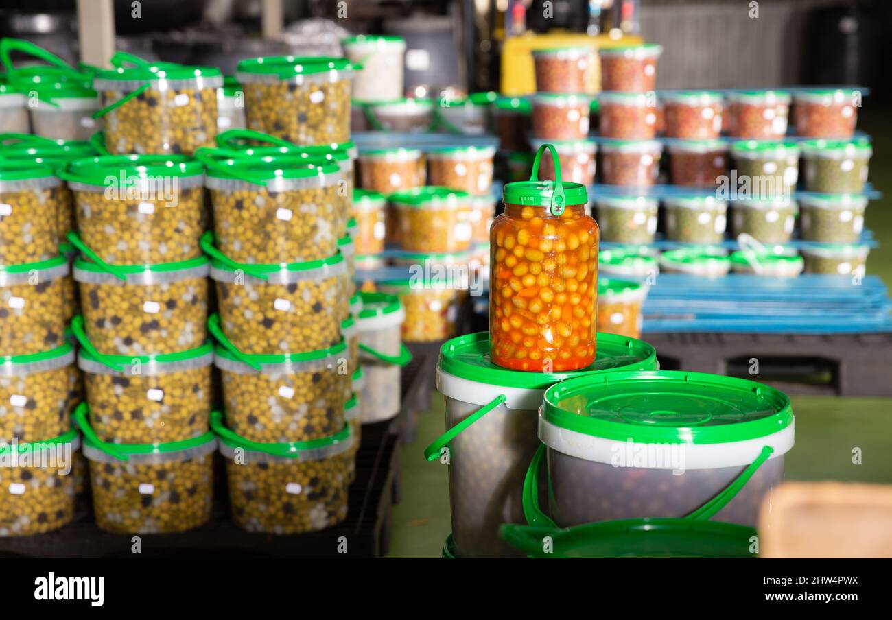 Pickled olives in plastic buckets Stock Photo Alamy