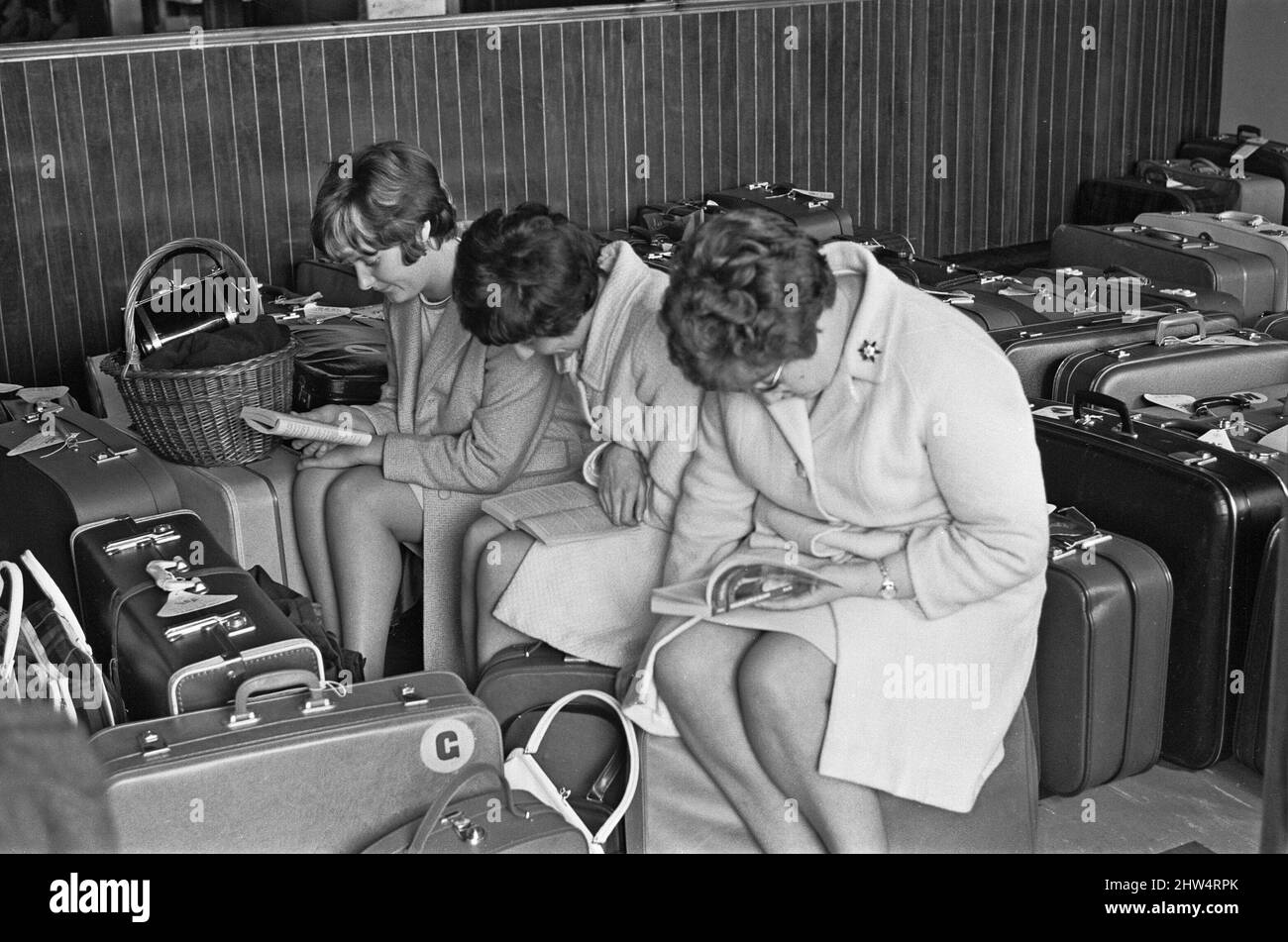 Holidaymakers waiting for their delayed flight to be called at Southend Airport 13th July 1968 Stock Photo