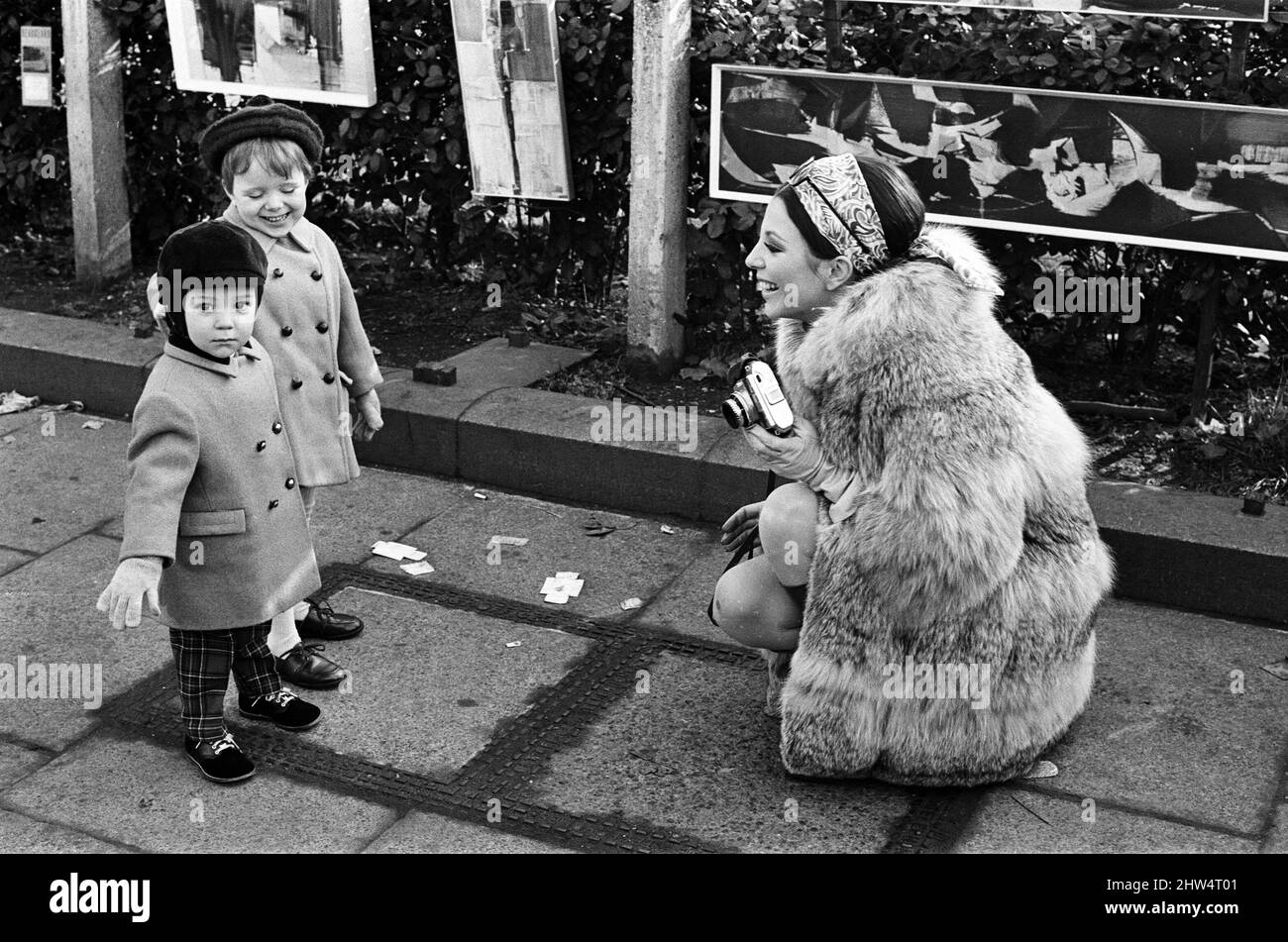 Joan Collins on the set of her new film 'Subterfuge' with her children Sacha and Tara Newley. 4th February 1968. Stock Photo