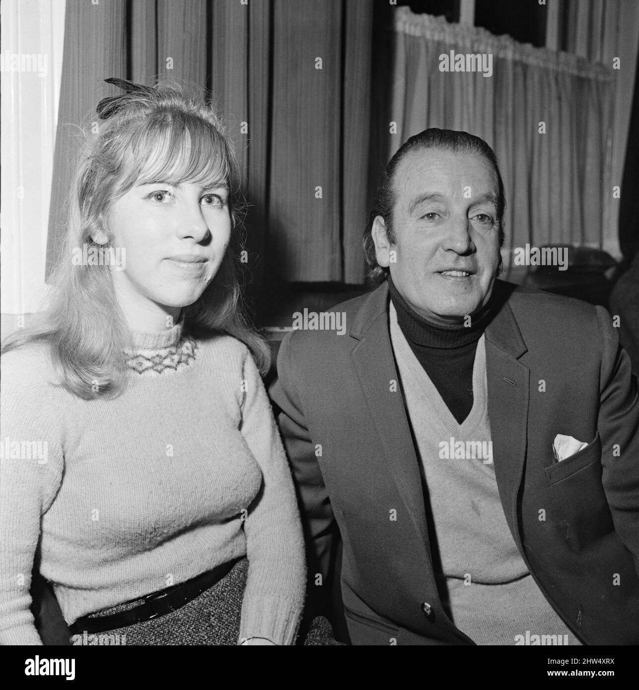 Alfred Lennon, (also knowns as Freddie Lennon), is the father of Beatle John Lennon.Alfred (aged 55) is pictured here with 19 year old Pauline Cole, a former student of Exeter University, who he plans to marry.  Full interview with Alfred Lennon is in The Daily Mirror 6th January 1968, page 1 and back page 28, that says the following....  John Lennon has ended his feud with his father, who left the family home when John was only 4 years old.  Alfred went to sea as a ships steward and later learned that his wife, Julia, had been killed in a road accident in 1958.  In 1964, Alfred suddenly turne Stock Photo