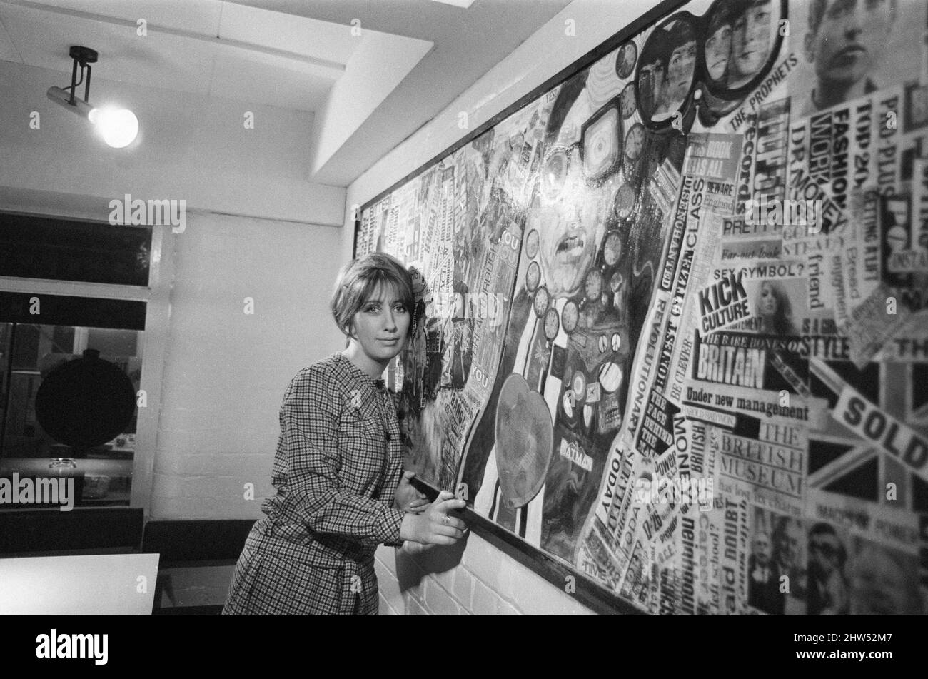 Jean Fairclough, Artist from Bolton, aged 24 years old, pictured with her mural, which is currently hanging on the wall of the new YMCA building in Bury, Lancashire, 3rd January 1967. Stock Photo