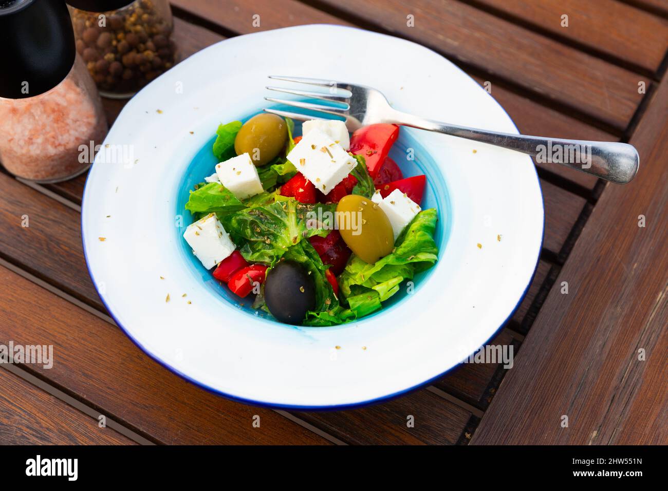 Traditional greek vegetable salad with cheese feta and olives Stock Photo