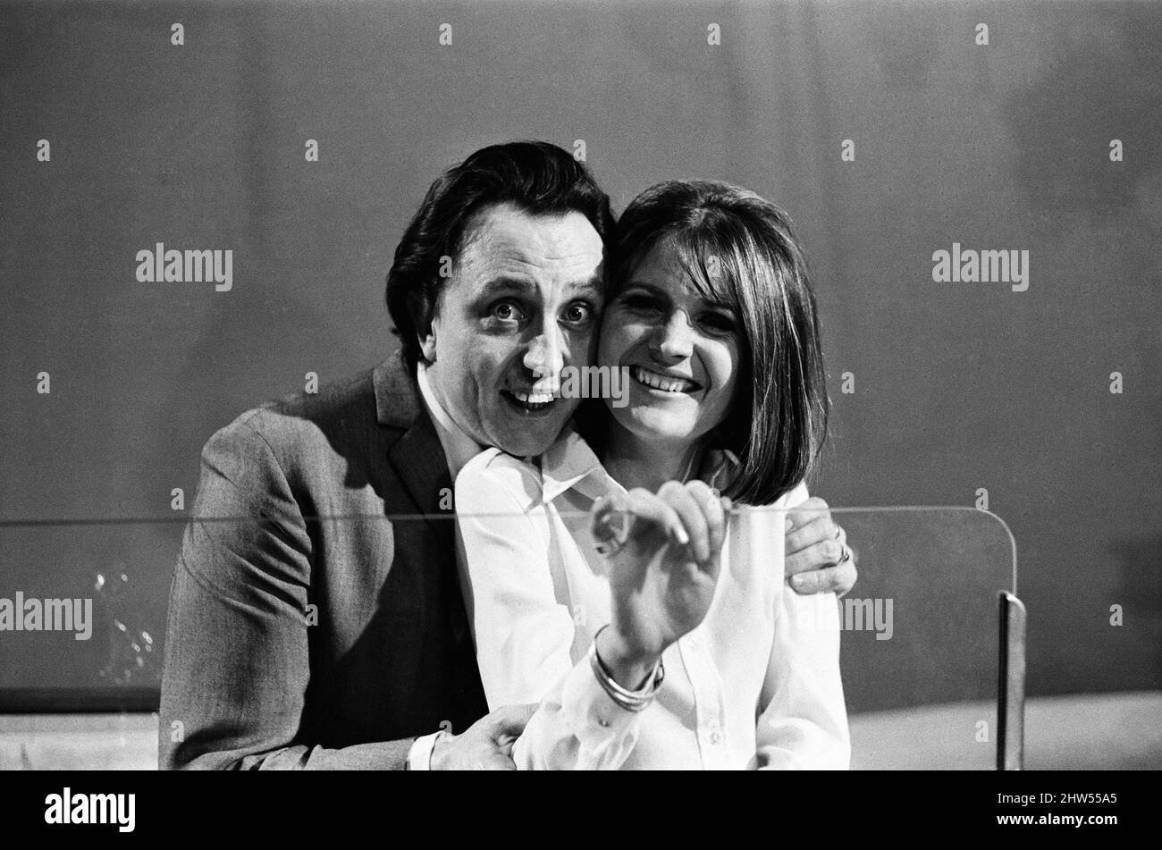 Sandie Shaw and Ken Dodd appear on the ABC Television Show 'Doddy's Music Box.' They are pictured in the 1912 Rover car used in the show, which is filmed in Didsbury, Manchester. 24th January 1967. Stock Photo