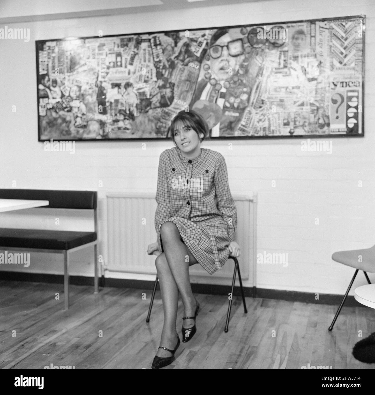 Jean Fairclough, Artist from Bolton, aged 24 years old, pictured with her mural, which is currently hanging on the wall of the new YMCA building in Bury, Lancashire, 3rd January 1967. Stock Photo