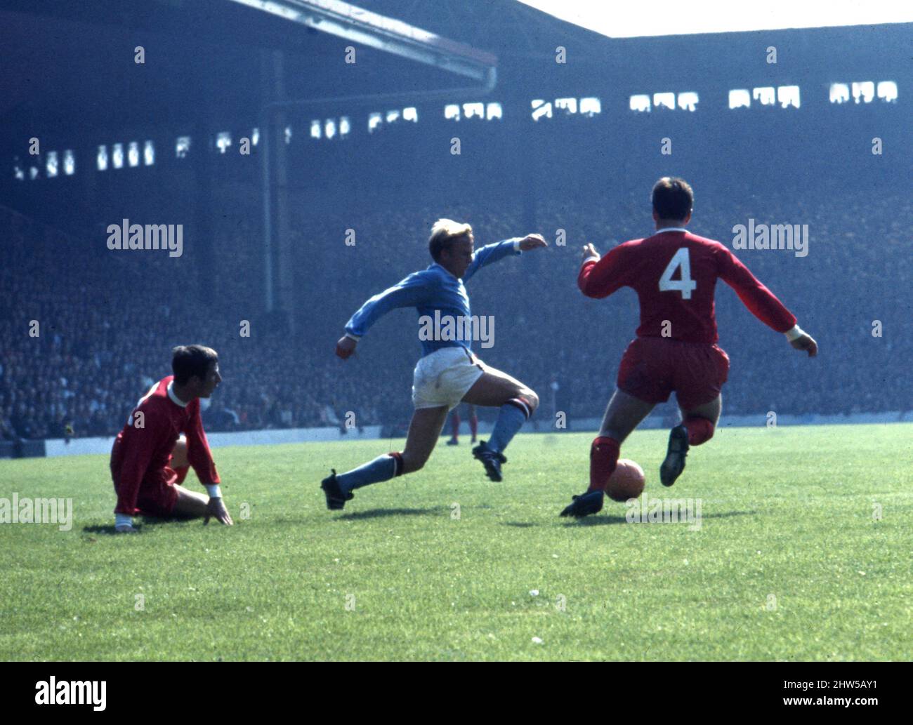 English League Division One match at Anfield. Liverpool 2 v Manchester City 1.  City's Francis Lee on the ball challenged by Liverpool defenders Peter Wall and Tommy Smith.  10th August 1968. Stock Photo