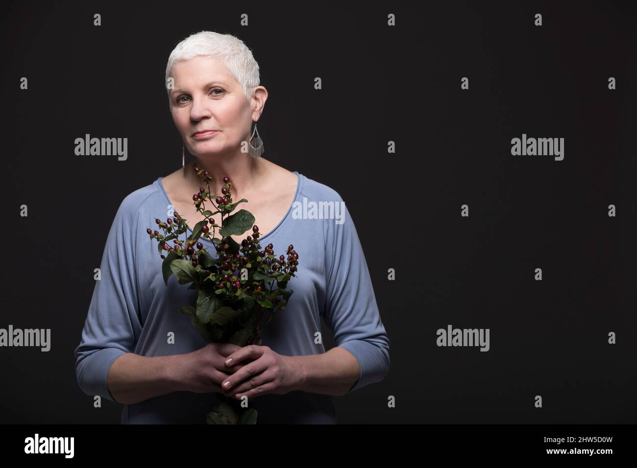 Woman in blue shirt hi-res stock photography and images - Alamy