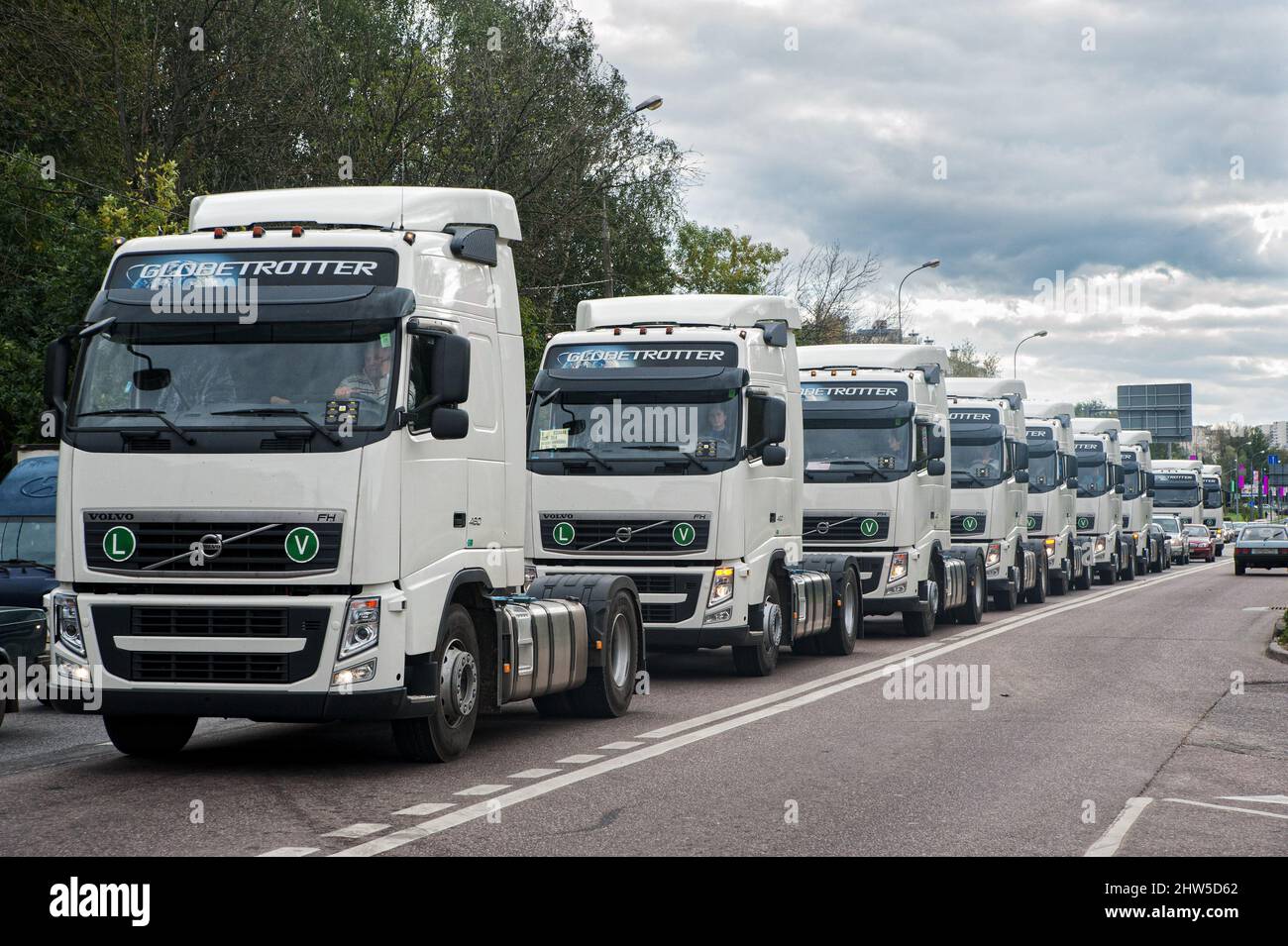 A column of new Volvo truck tractors in Russia. Stock Photo
