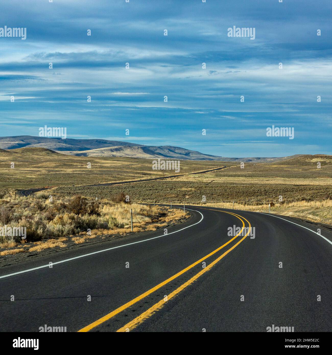 United States, Nevada, Winnemucca, Empty highway in desert Stock Photo