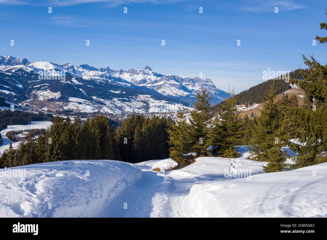 This landscape photo was taken in Europe, in France, Rhone Alpes, in Savoie, in the Alps, in winter. You can see the Chaine des Aravis, its hiking tra Stock Photo