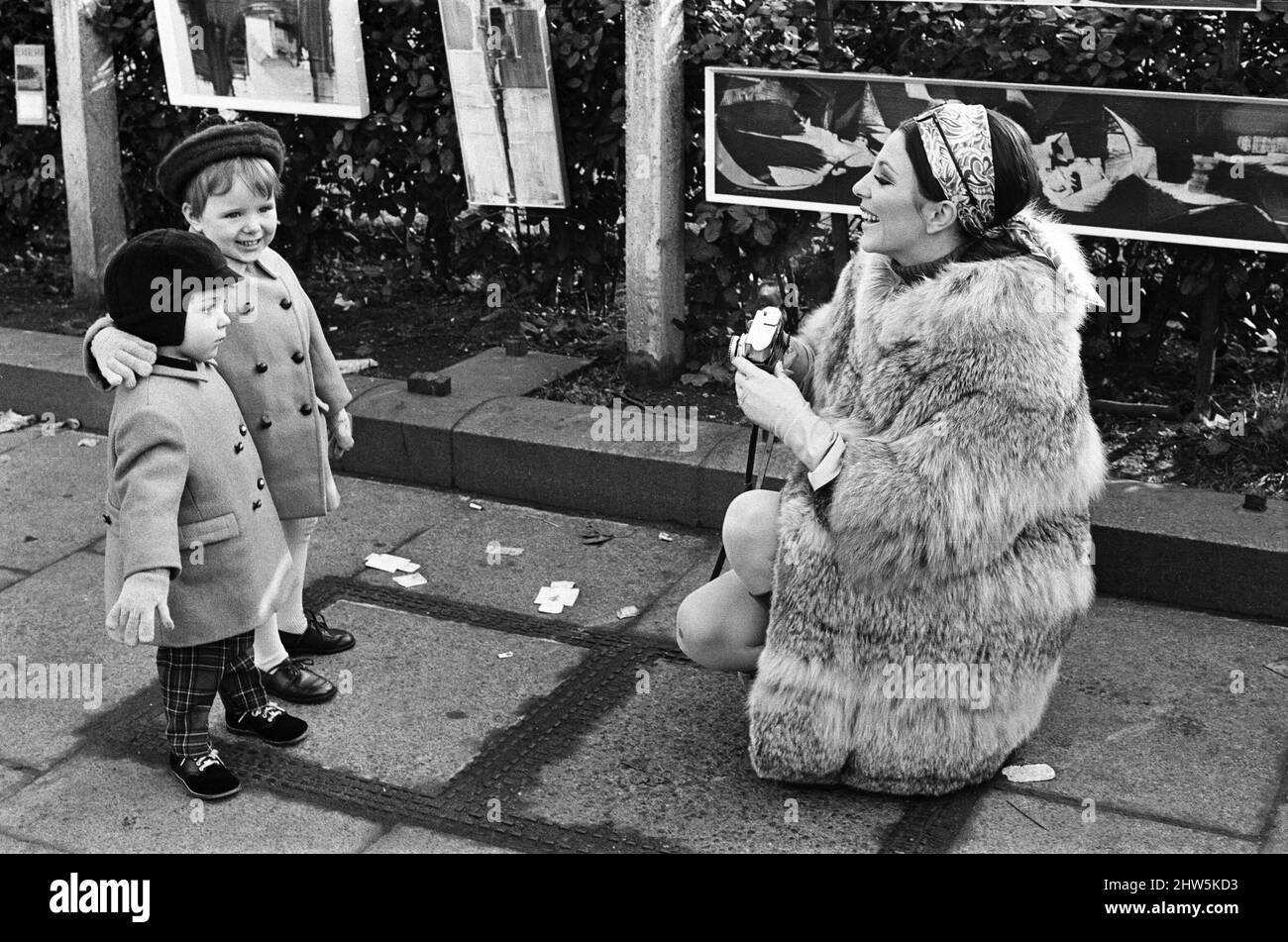 Joan Collins on the set of her new film 'Subterfuge' with her children Sacha and Tara Newley. 4th February 1968. Stock Photo