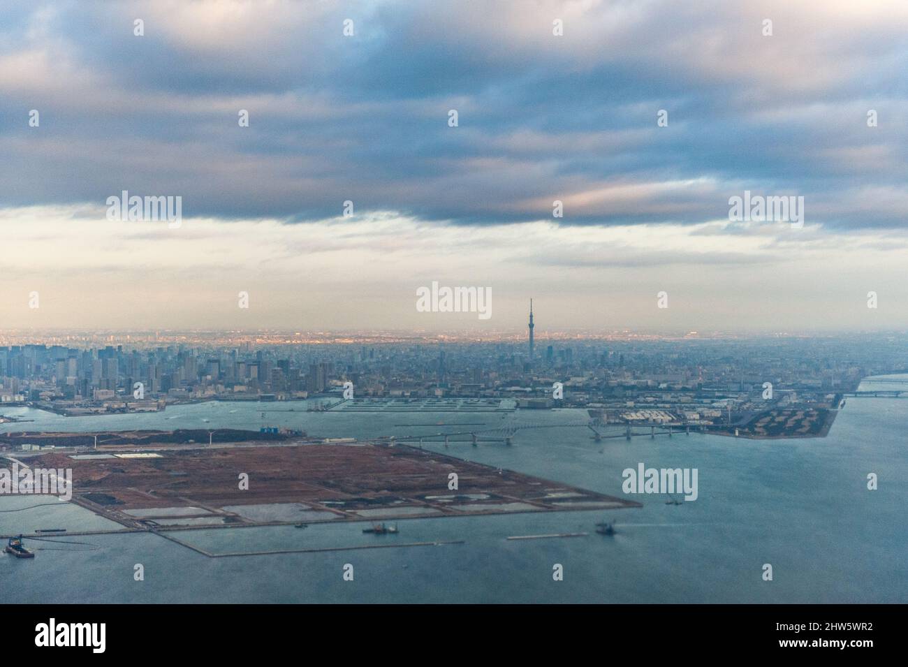 Aerial overview of downtown Tokyo around sunrise. Seen from Haneda Airport. Stock Photo