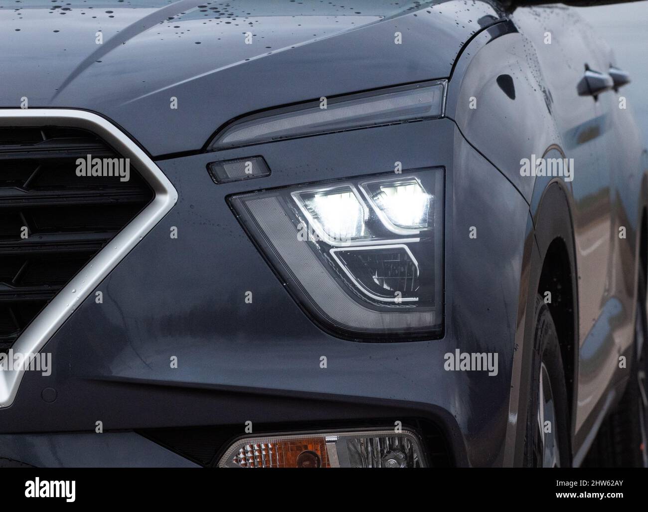 Exterior of a new car. Front LED low beam and high beam headlights