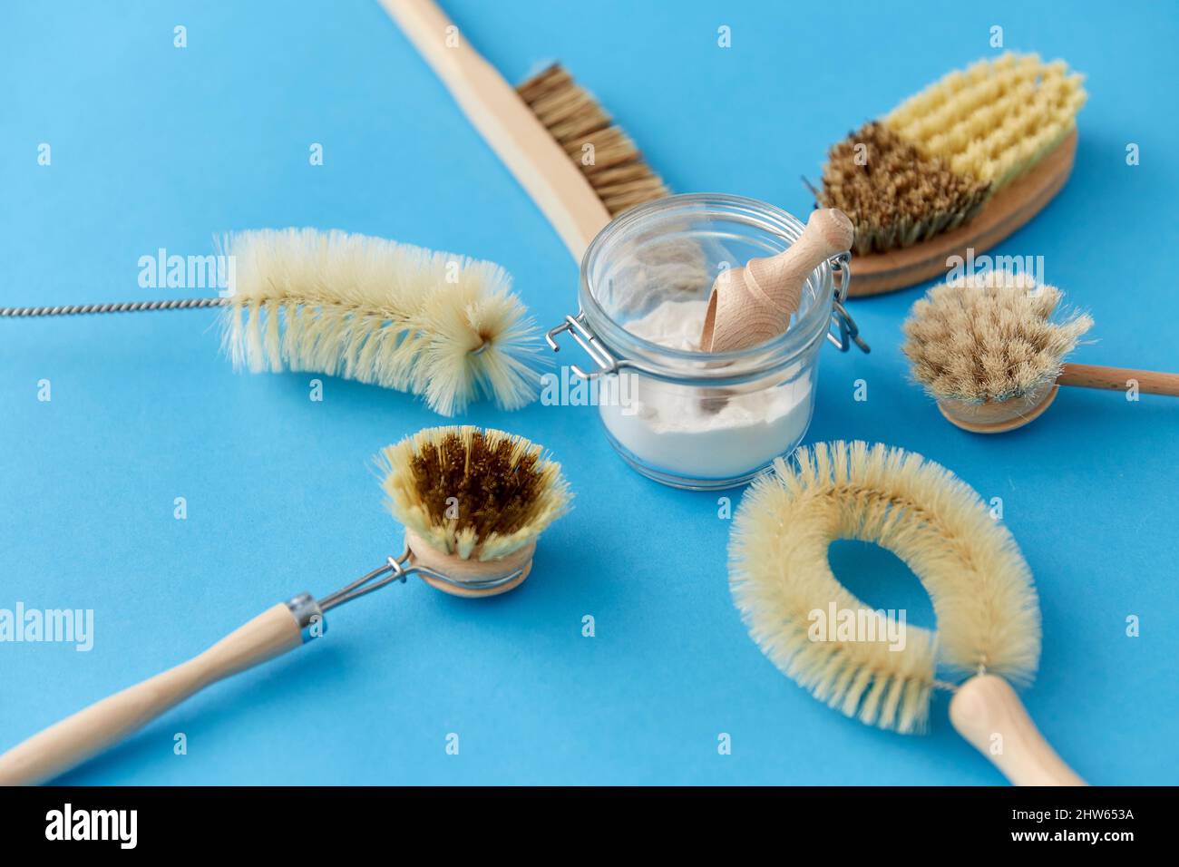 cleaning brushes and soda powder with scoop in jar Stock Photo Alamy