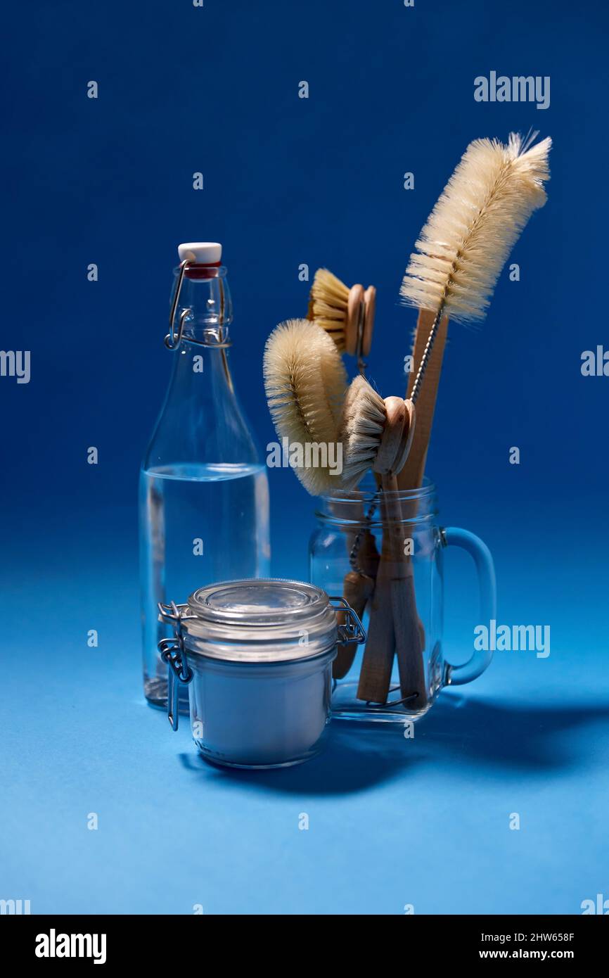 washing soda, bottle of vinegar and brushes Stock Photo Alamy