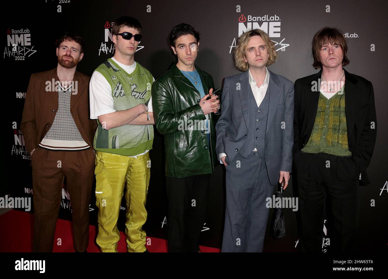 Mar 02, 2022 - London, England, UK - Carlos O'Connell, Tom Coll, Conor Curley, Conor Deegan III and Grian Chatten for Fontaines D.C attends The NME Aw Stock Photo
