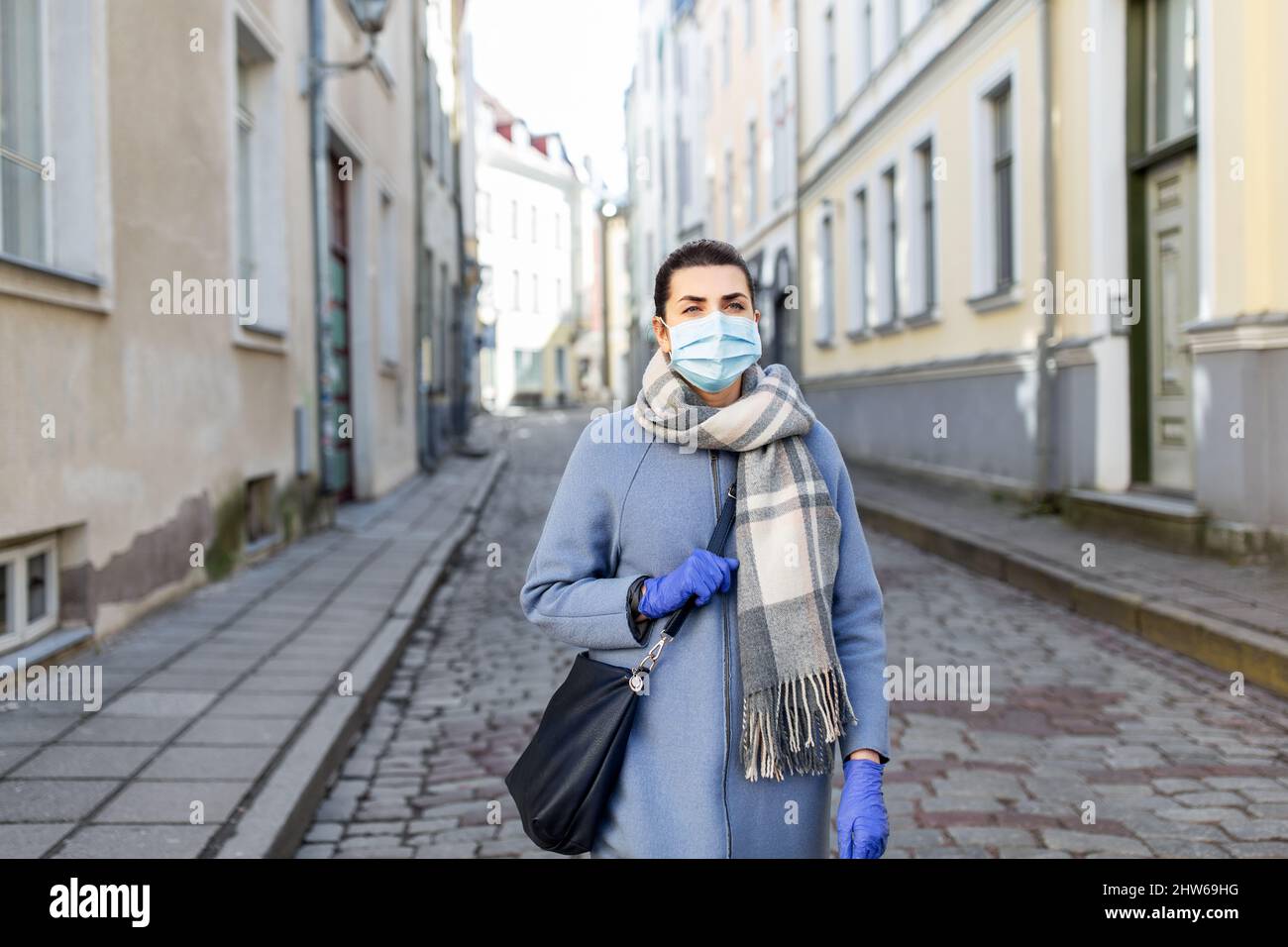 Old woman mask gloves hi-res stock photography and images - Alamy