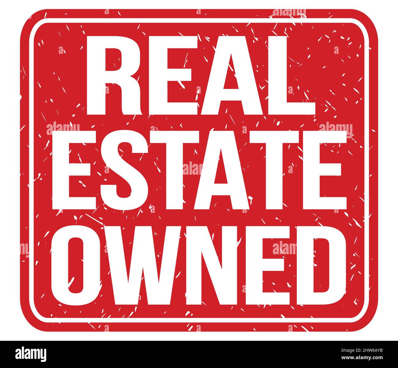 REAL ESTATE OWNED, text written on red vintage stamp sign Stock Photo