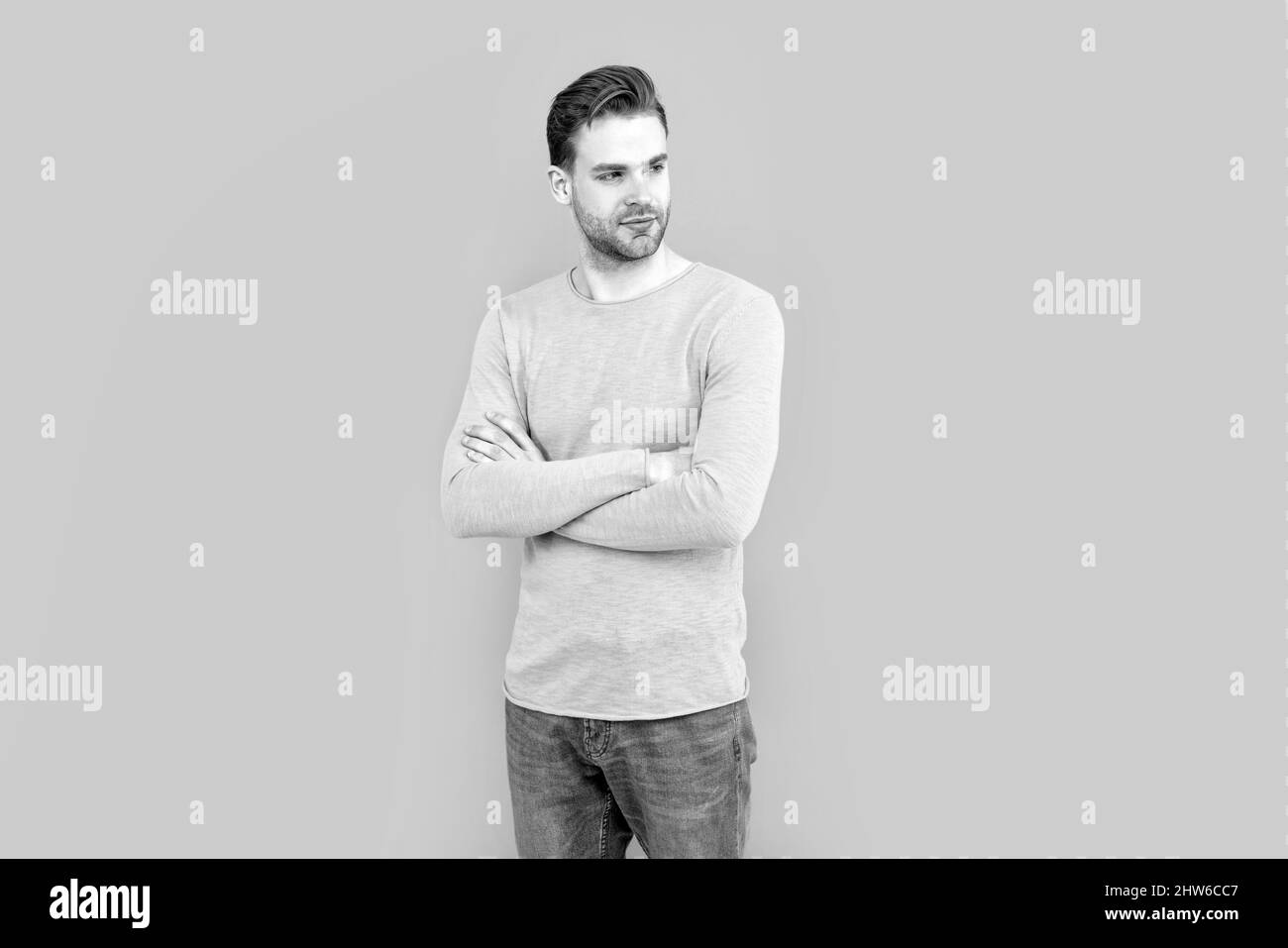 Put on confidence. Confident man grey background. Fashion man keep arms crossed Stock Photo