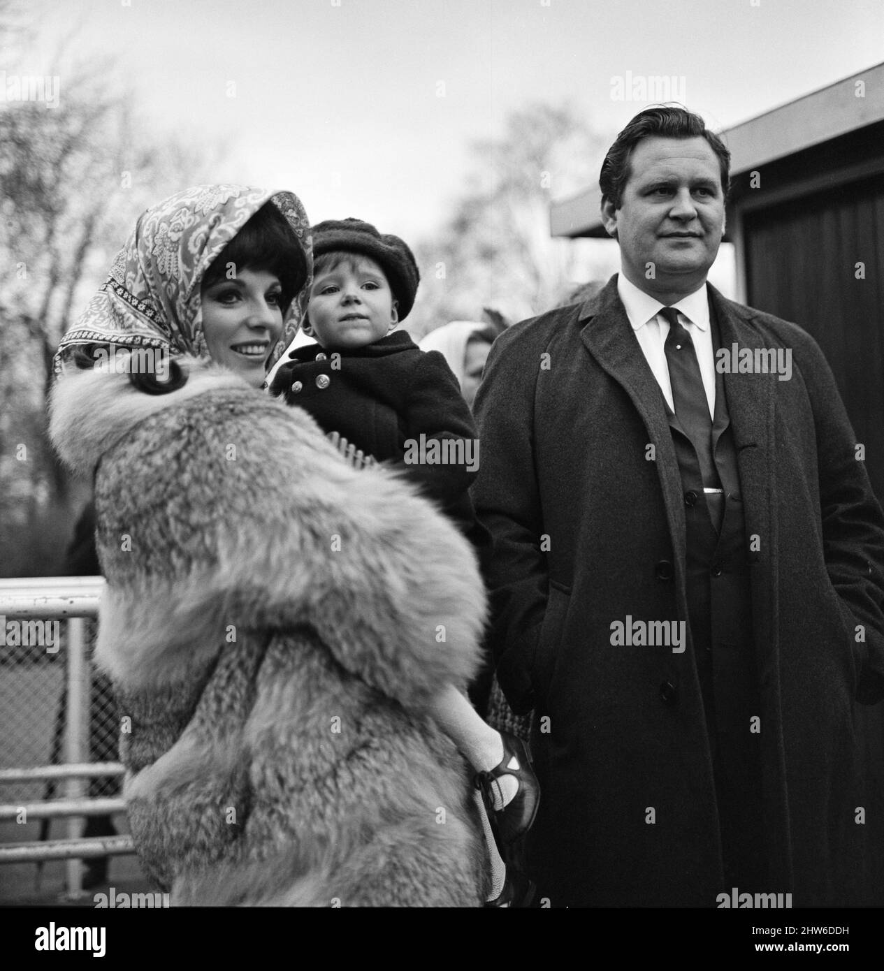 Joan Collins on the set of her new film 'Subterfuge' in Regents Park with her daughter Tara Newley and Trevor Wallace, executive producer of the film. Filming was stopped for the day when one of the cameras was damaged after falling over. 16th January 1968. Stock Photo