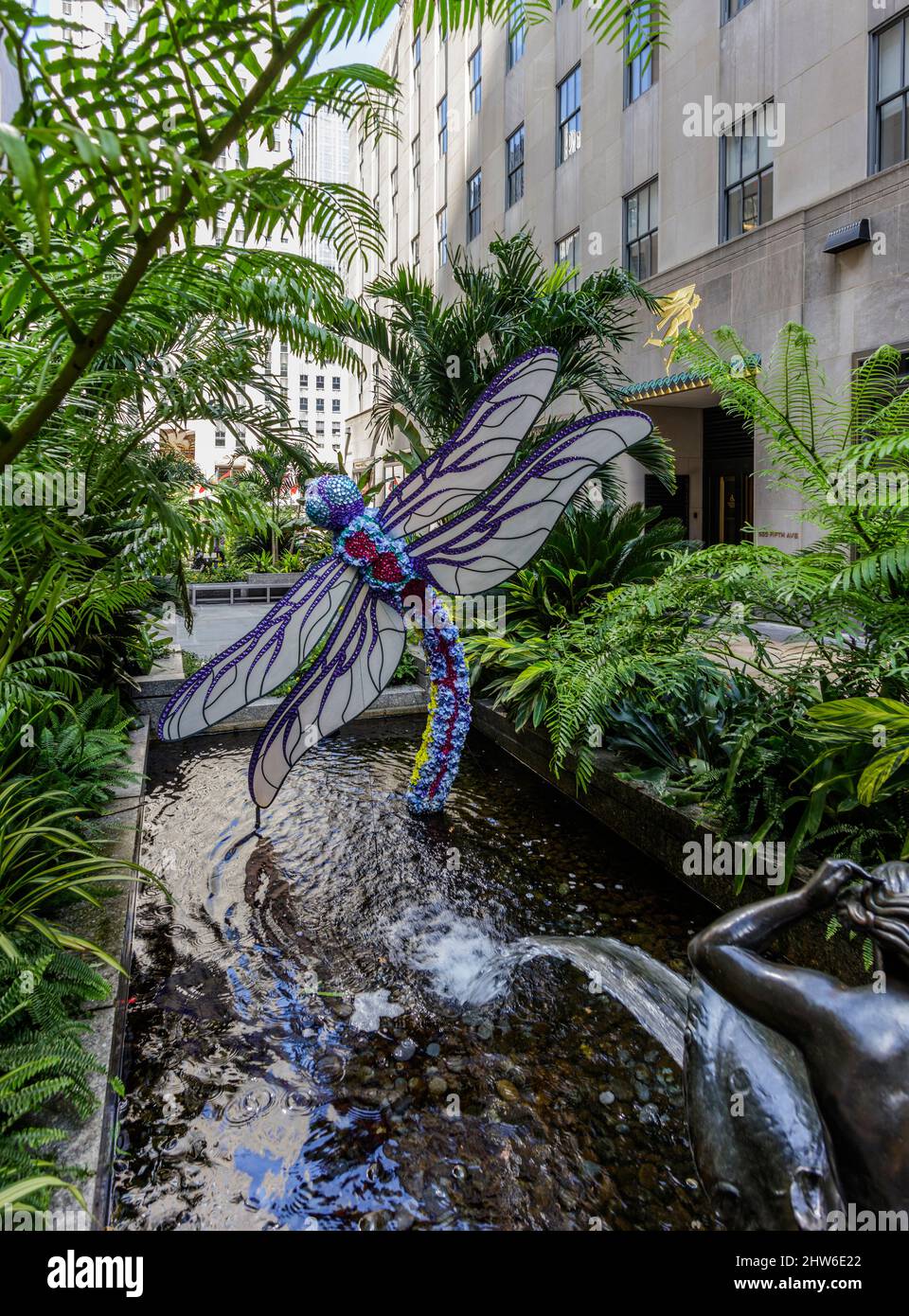 New York City, United States - August 25, 2008: Rockefeller Center: fountain and sculpture in the Channel Gardens. Stock Photo