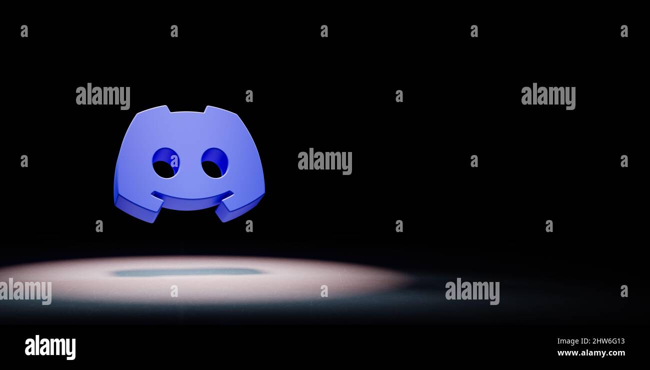 Discord Logo Spotlighted on Black Background Stock Photo - Alamy