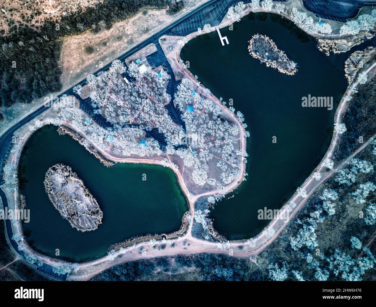 Aerial view of a natural landscape surrounded by lakes Stock Photo - Alamy