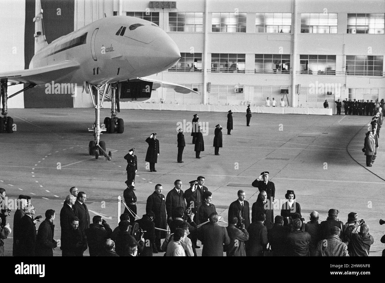 Concorde, prototype 001 makes its first official public appearance as it is unveiled from its Sud Aviation's hanger in Toulouse, France, Monday 11th December 1967. Our Picture Shows ... dignitaries Tony Benn, Britain's Minister of Technology, and Jean Chamant, French Minister of Transport at Concorde's official roll out ceremony at Toulouse. Stock Photo