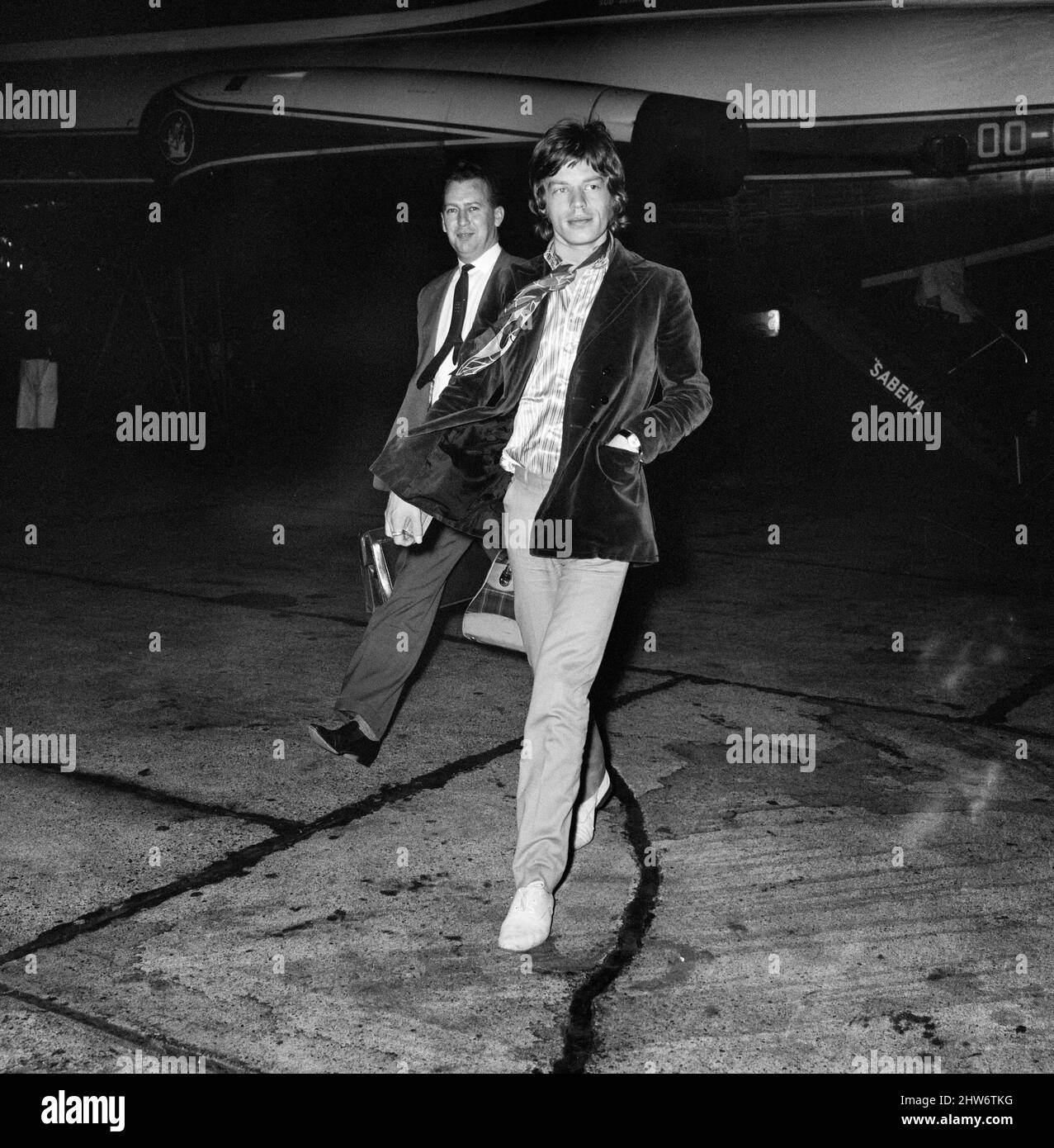 Lead singer of The Rolling Stones pop group Mick Jagger arriving at