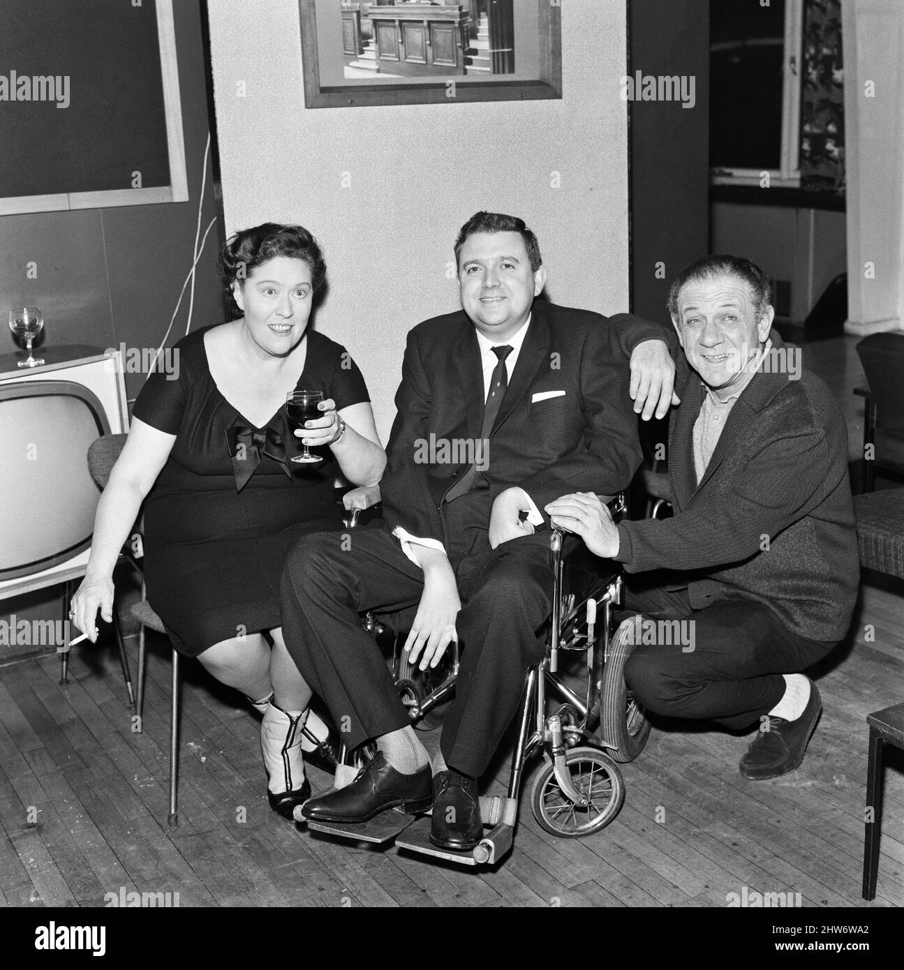 Peggy Mount and Sid James with the scriptwriter of the new TV series