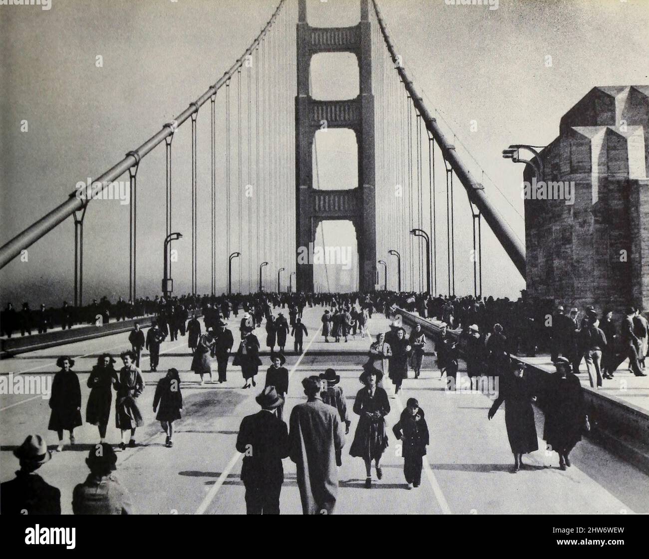 May 27, 1937 was designated Pedestrian Day and thousands of people enjoyed exclusive use of the bridge on the day before it was opened to vehicle traffic from The Golden Gate Bridge; report of the Chief Engineer to the Board of Directors of the Golden Gate Bridge and Highway District, California, September, 1937 Stock Photo