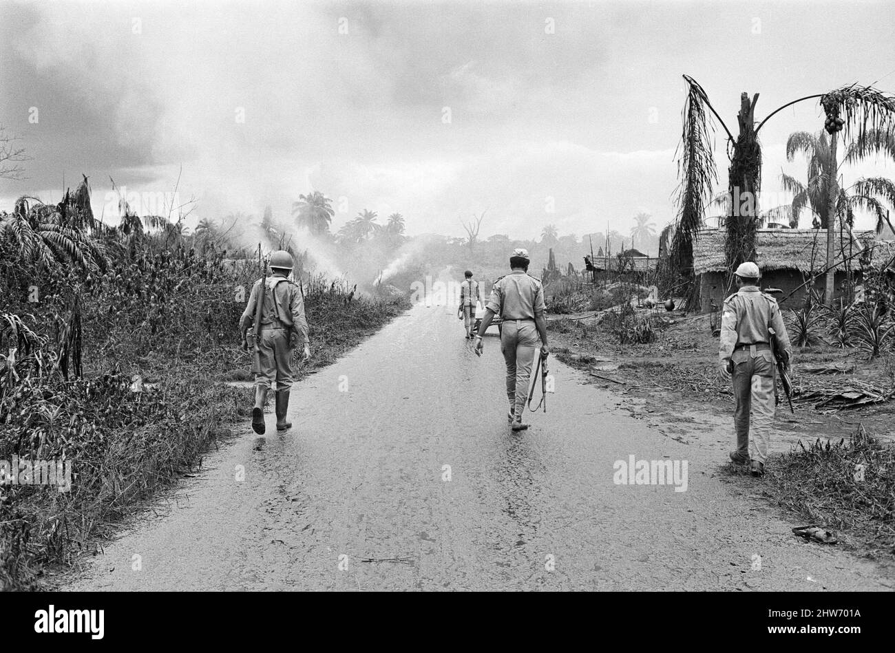 Biafran soldiers seen here advancing towards the Nigerian army during the Biafran conflict. 11th June 1968  The Nigerian Civil War, also known as the Biafran War endured for two and a half years, from  6 July 1967 to 15 January 1970, and was fought to counter the secession of Biafra from Nigeria. The indigenous Igbo people of Biafra felt they could no longer co-exist with the Northern-dominated federal government following independence from Great Britain. Political, economic, ethnic, cultural and religious tensions finally boiled over into civil war following the 1966 military coup, then  coun Stock Photo